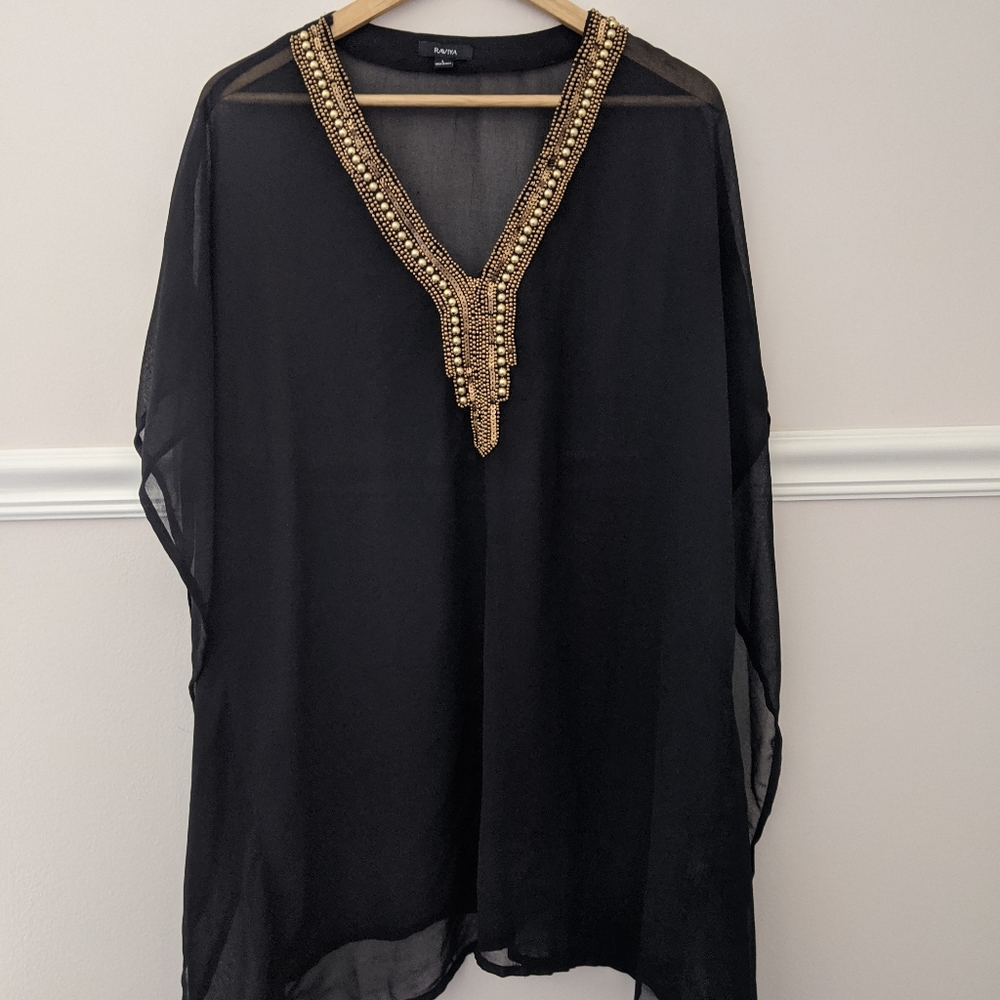 Black swim cover-up with gold accent